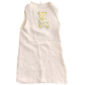 1970s white baby sleeper with teddy bear